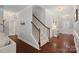 Welcoming hallway with a staircase and stylish decor, connecting different areas of the home at 2352 Seagull Dr, Denver, NC 28037