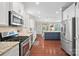 Stylish kitchen featuring granite countertops, stainless steel appliances, and a functional layout at 2352 Seagull Dr, Denver, NC 28037