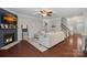 Spacious living room featuring a fireplace, stylish decor, and an open floor plan at 2352 Seagull Dr, Denver, NC 28037