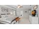 Spacious main bedroom features a trey ceiling, carpeted floors, and a seating area at 2352 Seagull Dr, Denver, NC 28037