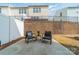 Cozy backyard patio with seating, perfect for enjoying outdoor living and entertaining at 2463 Diplomat Ln, Charlotte, NC 28210