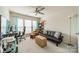 Comfortable and inviting living room with desk, seating, and storage at 2463 Diplomat Ln, Charlotte, NC 28210