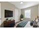 Cozy bedroom featuring a modern design, natural light, and comfortable furnishings, perfect for restful nights at 2708 Catalina Ave, Charlotte, NC 28206