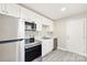 Modern kitchen featuring stainless steel appliances, sleek cabinetry, and functional layout, ideal for cooking at 2708 Catalina Ave, Charlotte, NC 28206
