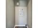 Functional laundry hookups in a small room with neutral paint, a white utility sink, and durable flooring at 2708 Catalina Ave, Charlotte, NC 28206