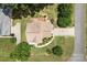 Aerial view of home showcasing roof, manicured lawn, driveway, and mature trees at 329 Squirrel Ln, Clover, SC 29710