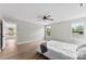 This bright and airy bedroom has large windows and hardwood floors, creating a warm and inviting space at 329 Squirrel Ln, Clover, SC 29710