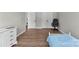This bright bedroom features hardwood floors, neutral walls, and a large closet at 329 Squirrel Ln, Clover, SC 29710