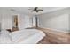This spacious bedroom boasts lots of natural light and hardwood floors, creating a warm and inviting atmosphere at 329 Squirrel Ln, Clover, SC 29710