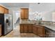 Eat-in kitchen features stainless appliances, granite counters, and bar seating at 329 Squirrel Ln, Clover, SC 29710