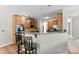 Open concept kitchen with a breakfast bar and modern appliances at 329 Squirrel Ln, Clover, SC 29710