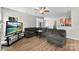 Inviting living room with modern flooring, a ceiling fan, and plenty of seating at 329 Squirrel Ln, Clover, SC 29710
