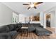 Bright living room, ceiling fan, an open layout, and seamless flow to other living spaces at 329 Squirrel Ln, Clover, SC 29710