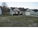 Well-maintained single-story home with a one car garage situated on a spacious lot at 4718 Sahalee Ln, Charlotte, NC 28216