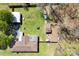 Aerial view showcasing a backyard featuring a detached garage and a shed, perfect for outdoor activities at 4937 Lebanon Dr # 1, Charlotte, NC 28273