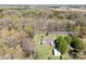 Aerial view of the home on a sprawling lot with mature trees; conveniently located close to town at 4937 Lebanon Dr # 1, Charlotte, NC 28273