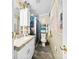 Well-lit bathroom with a stained glass shower door at 4937 Lebanon Dr # 1, Charlotte, NC 28273