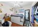 Bedroom featuring built-in storage and a full-length mirror at 4937 Lebanon Dr # 1, Charlotte, NC 28273
