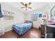 Inviting bedroom with hardwood floors and sun-filled windows at 4937 Lebanon Dr # 1, Charlotte, NC 28273