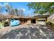 A large driveway leads to the garage of this brick house, offering ample parking at 4937 Lebanon Dr # 1, Charlotte, NC 28273