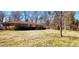 Sprawling brick home with large front yard and mature trees provides great curb appeal at 4937 Lebanon Dr # 1, Charlotte, NC 28273