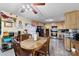 Cozy kitchen featuring wood cabinetry and a dining area that creates a warm and inviting atmosphere at 4937 Lebanon Dr # 1, Charlotte, NC 28273