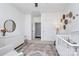 A bright Bedroom with white furniture, a cozy crib, and soft lighting to promote rest at 5019 Mill Creek Rd, Clover, SC 29710