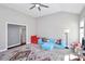 A charming bonus room featuring vaulted ceilings, neutral paint, and ample natural light for versatile use at 5019 Mill Creek Rd, Clover, SC 29710