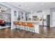 Spacious kitchen featuring a large island, pendant lighting, and stainless steel appliances at 5019 Mill Creek Rd, Clover, SC 29710