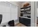 Well-lit home office featuring floating shelves, modern desk, and ample natural light at 826 Misty Arbor Frd, Clover, SC 29710