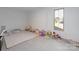 Bright playroom featuring a play tent, ball pit, kid-sized furniture, and plenty of space for activities at 826 Misty Arbor Frd, Clover, SC 29710