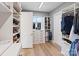 Organized walk-in closet with custom shelving, drawers, and ample storage space at 826 Misty Arbor Frd, Clover, SC 29710