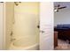 Bathroom with a shower over tub setup and attached bedroom view at 8422 Chaceview Ct, Charlotte, NC 28269