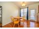 Cozy dining area with hardwood floors, natural light and backyard access at 8422 Chaceview Ct, Charlotte, NC 28269