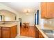 Bright dining area featuring hardwood floors and a direct view of the kitchen area at 8422 Chaceview Ct, Charlotte, NC 28269