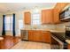 Well-lit kitchen with stainless appliances, double sinks and bright natural light at 8422 Chaceview Ct, Charlotte, NC 28269