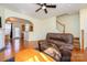 Inviting living area with hardwood floors, staircase and seamless flow to kitchen at 8422 Chaceview Ct, Charlotte, NC 28269