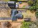 Aerial view of the home featuring the house, backyard, driveway, and roof at 8624 Sharonbrook Dr, Charlotte, NC 28210