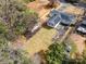 Aerial view of the roof and backyard, including a shed at 8624 Sharonbrook Dr, Charlotte, NC 28210