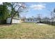 A view of the backyard featuring a shed and a large yard at 8624 Sharonbrook Dr, Charlotte, NC 28210