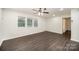 Bright living room with new laminate floors, fresh paint and lots of natural light at 8624 Sharonbrook Dr, Charlotte, NC 28210