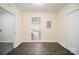Versatile room with hardwood floors and natural light; perfect for dining or home office at 8624 Sharonbrook Dr, Charlotte, NC 28210