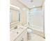 Bathroom features a combined tub and shower, modern fixtures and a neutral color scheme at 926 Poplar St, Albemarle, NC 28001