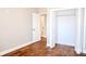 Cozy bedroom with hardwood floors and a view into the bathroom, plus a closet at 926 Poplar St, Albemarle, NC 28001