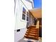 Charming home exterior with a welcoming covered porch and modern architectural details at 926 Poplar St, Albemarle, NC 28001