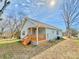 Exterior view of home with a porch featuring a backyard and fresh air at 926 Poplar St, Albemarle, NC 28001