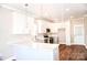 A new modern kitchen with stainless steel appliances and an island with granite counter tops at 926 Poplar St, Albemarle, NC 28001