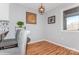 Dining area featuring hardwood floors, art, and natural light at 100 Willow Run Dr, Gastonia, NC 28056