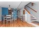 Dining area with access to the kitchen, front entry, and staircase at 100 Willow Run Dr, Gastonia, NC 28056