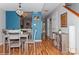 The dining area provides access to the kitchen, front entry, and stairs to the second story at 100 Willow Run Dr, Gastonia, NC 28056